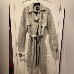 Grey coat.